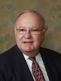 Stuart T. May, MD